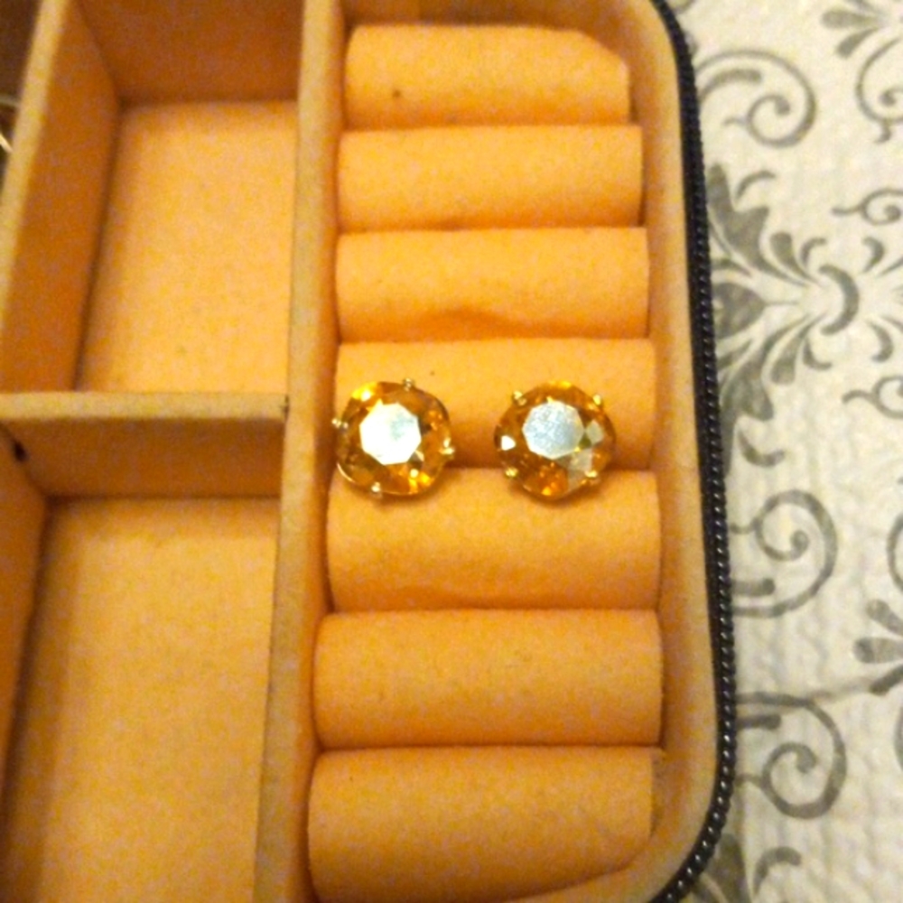 Topaz colored studs